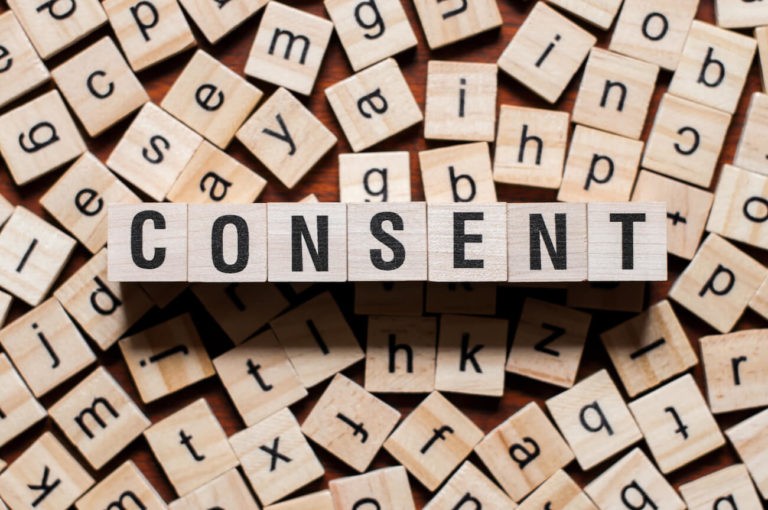 ‘Consent’ spelled out in wooden blocks.