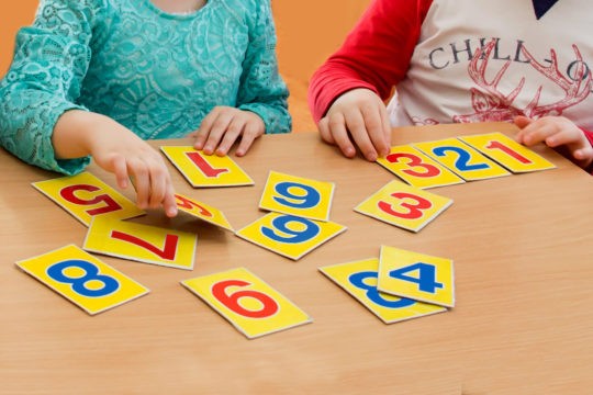 Various number cards scattered all over a table