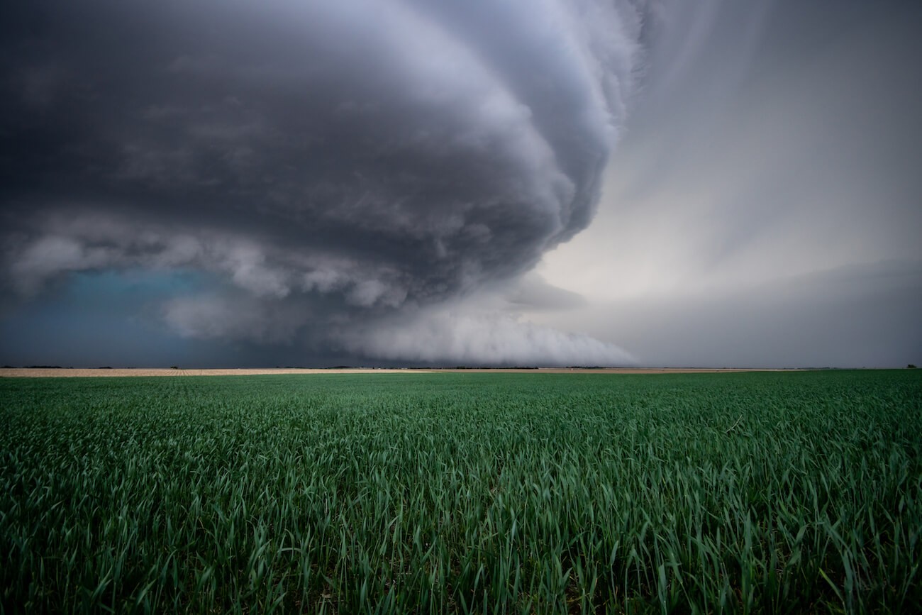 A tornado coming through in an open field